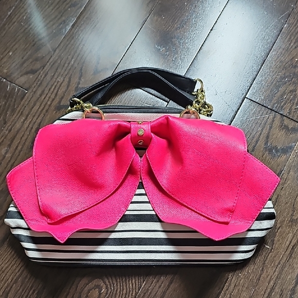 Betsey Johnson Handbags - Chic Striped Clutch with Pink Bow